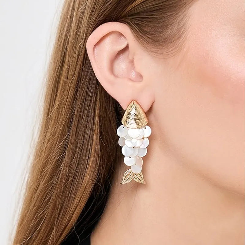 Fish-shaped earrings with pearl scales
