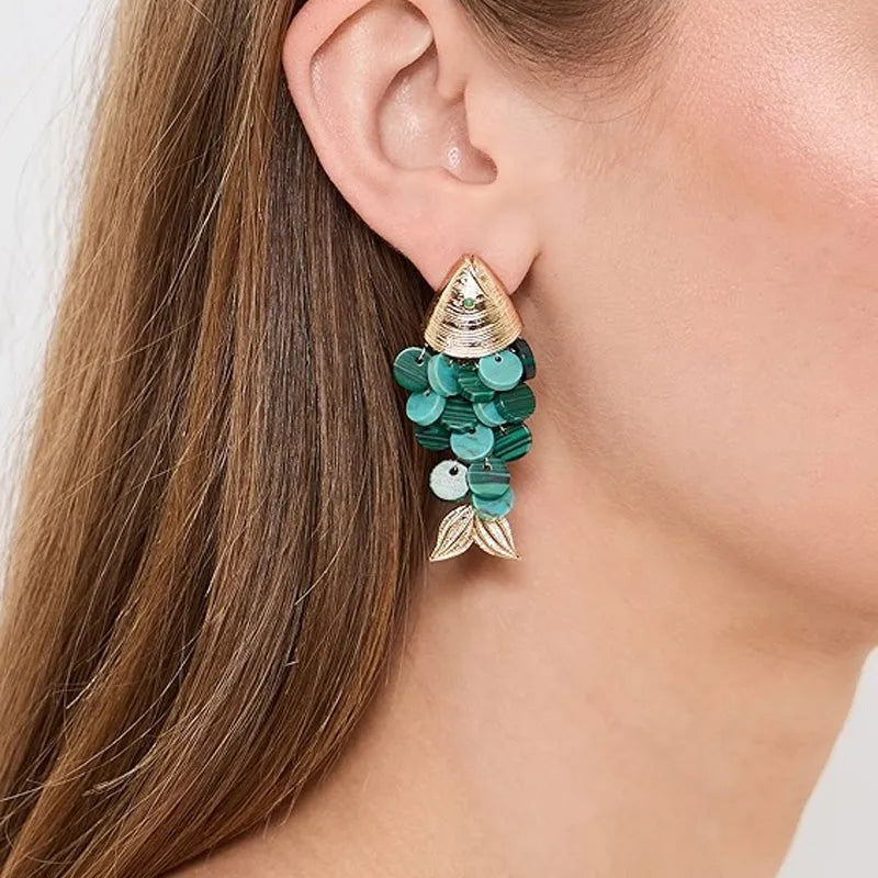Fish-shaped earrings with pearl scales